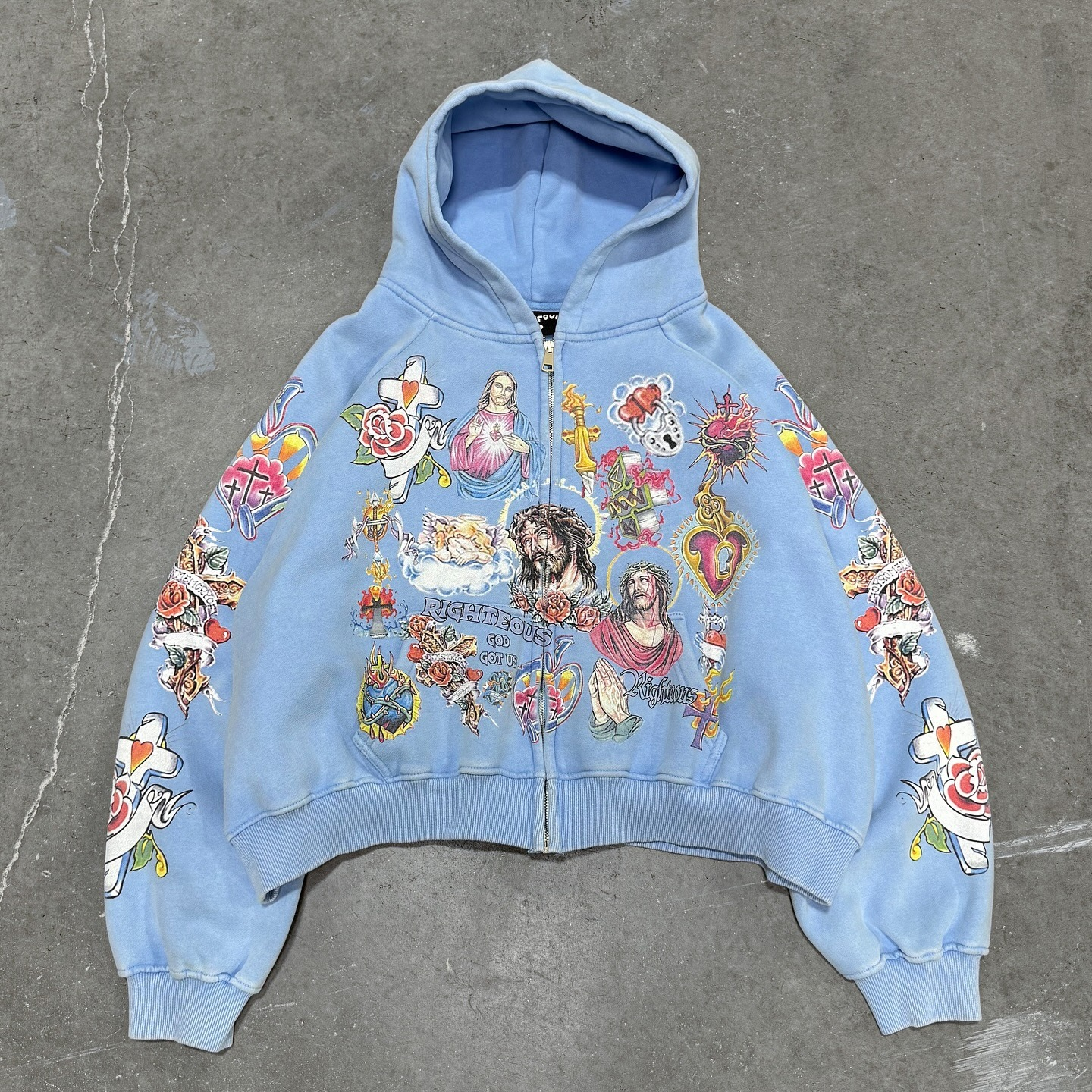 imgi_3_498246658_18029576822668164_5960134691413690779_n.webp We Are Righteous Risen King Zip Up Sky Blue - Image 1