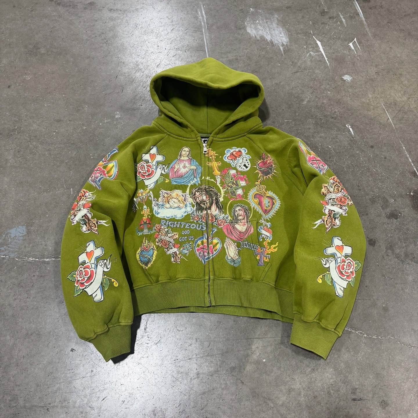 imgi_4_504188054_18032185328668164_7302581705515761176_n.webp We Are Righteous Moss” Risen King Zip Up - Image 1